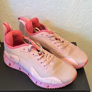Reebok kids Pink Athletic Shoes. Kids size 5 but fit like a women’s size 7.5.